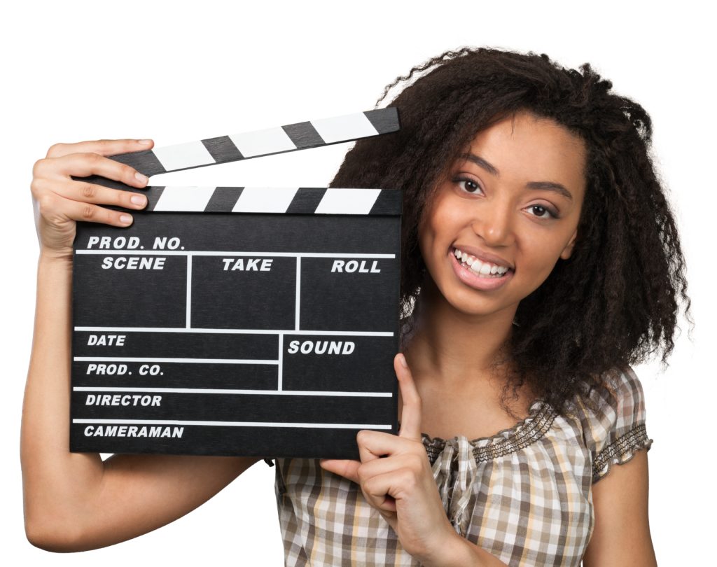 Young woman with movie clapper - Actrice émission casting international kheliastar